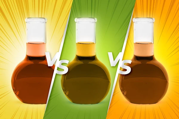 Three separate lab beakers showing Full Spectrum CBD vs. Broad Spectrum CBD vs. CBD Isolate