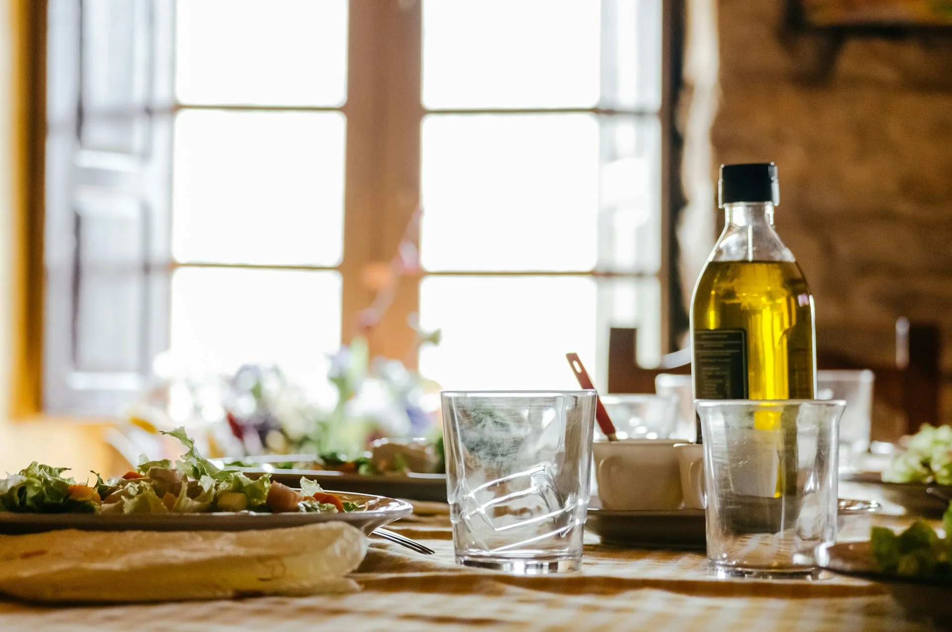 A bottle of hemp oil being used in the kitchen for cooking