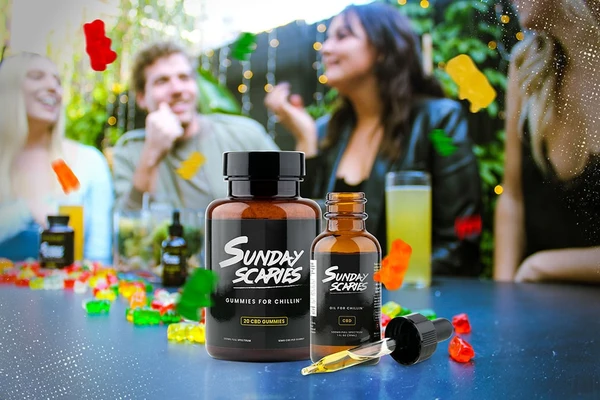 CBD products in front of a group of friends showing how the Preekend impacts the Sunday Scaries