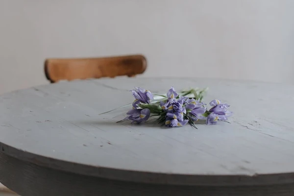 Lavender plant leaves laying on a round table