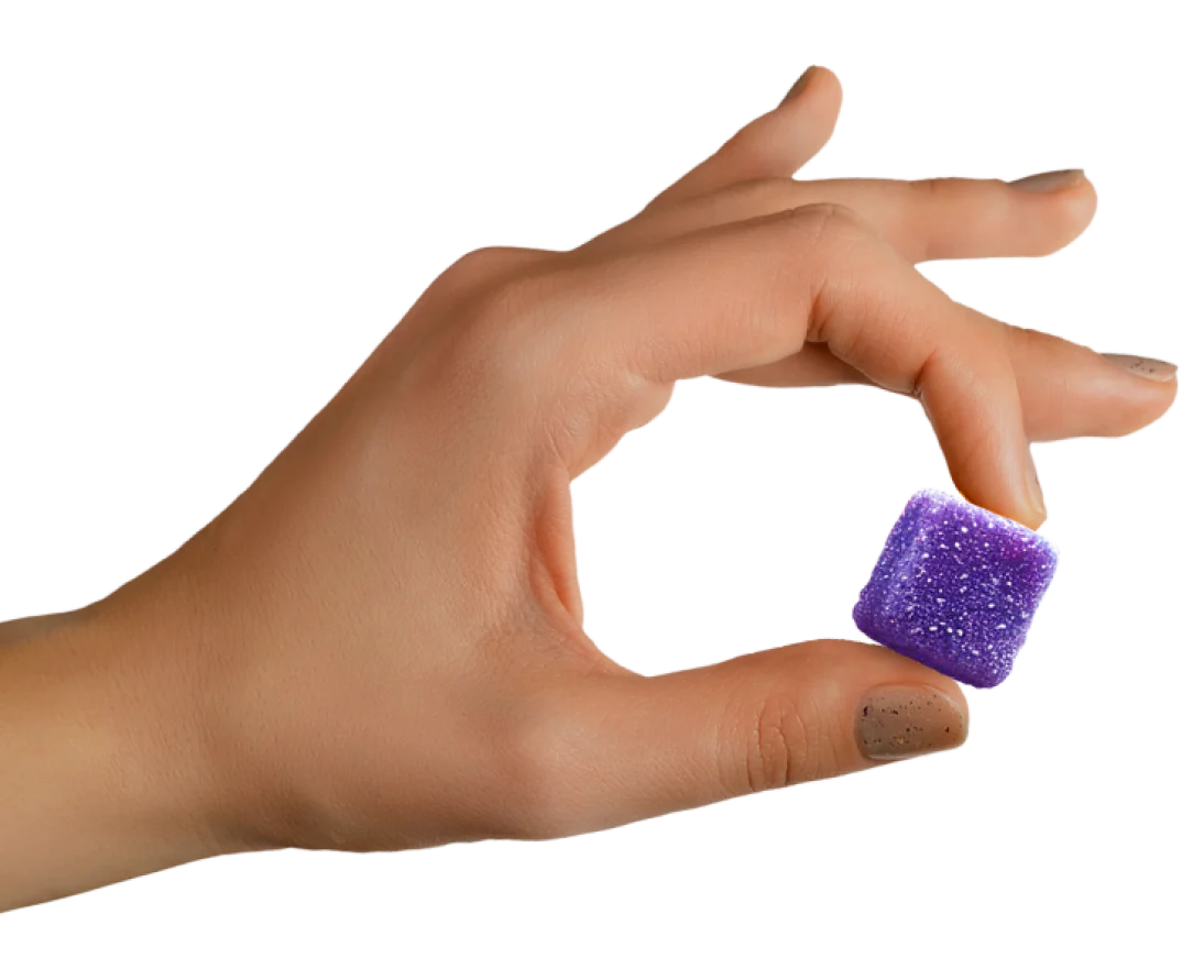 Hand holding a Sunday Scaries THC Gummy