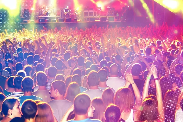 Concert goers get sad at the end of the show, visually answering the question "What is Post-concert Depression?"