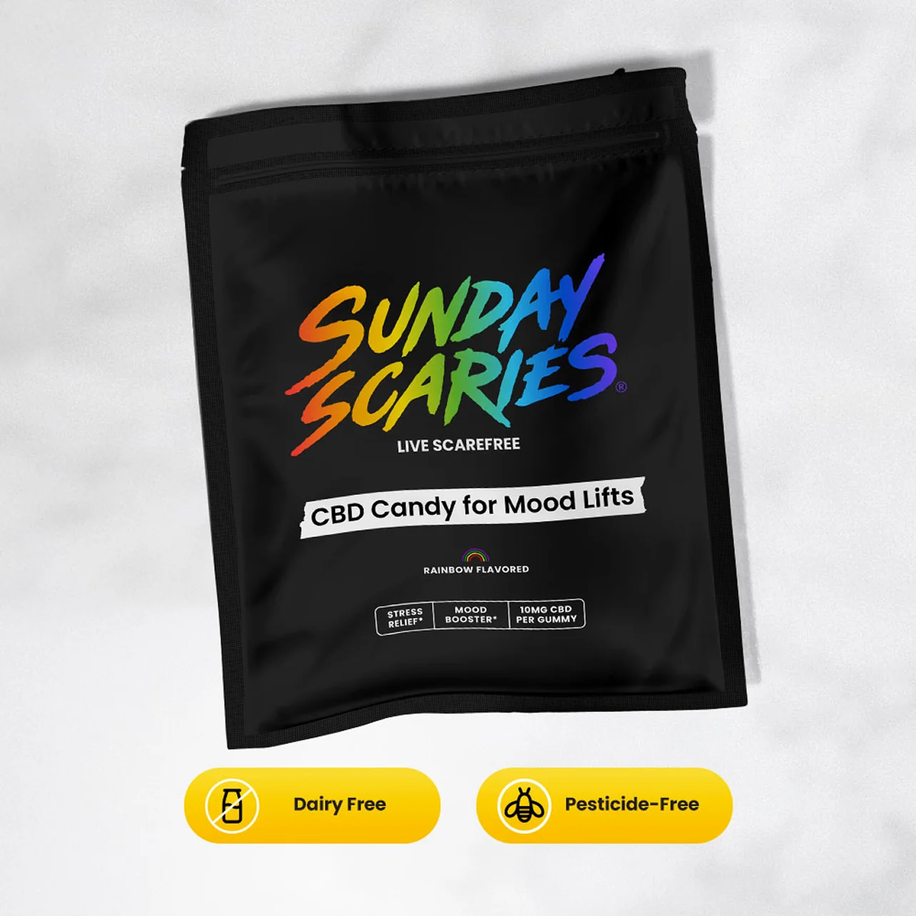 Black package of 'Sunday Scaries' CBD candy for mood lifts on a white background with product commitment icons