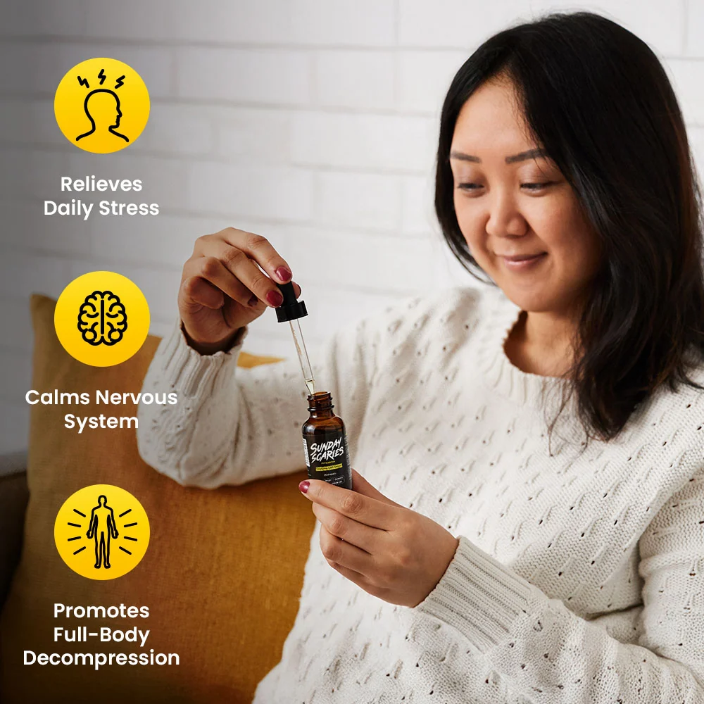 Woman holding a bottle of Sunday Scaries CBD Oil with icons and text about its benefits.