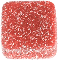 Red square vegan gummy with a sugary texture on a white background