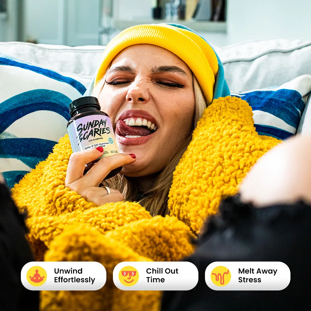 A woman chills out on her couch enjoying euphoric delta-9 gummies from Sunday Scaries