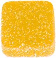 Yellow square vegan gummy with a sugary texture on a white background